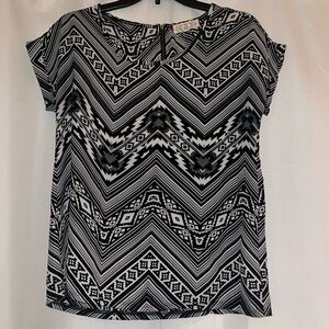 Black and white patterned blouse size small